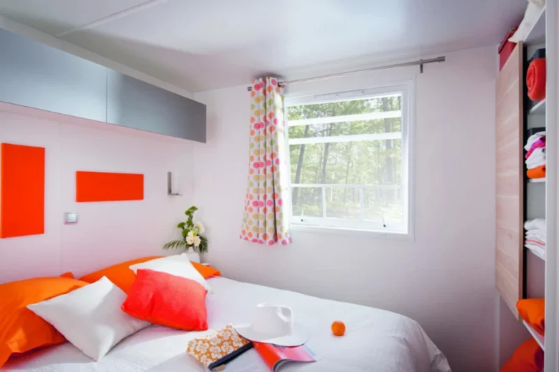 Slaapkamer in een cottage bij Camping La Colline