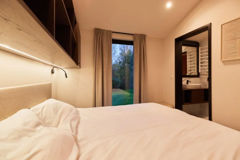 Slaapkamer van de Suite Lodge bij Harz Eco Lodges