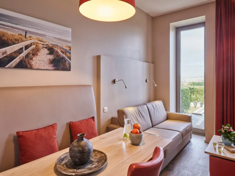 Woonruimte van een appartement bij Holiday Suites Westende