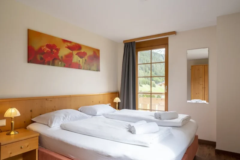 Slaapkamer van een appartement bij Landal Hochmontafon