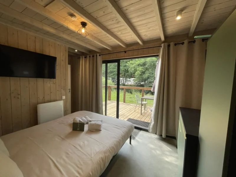 Slaapruimte in een verblijf bij Le Hameau de la Semois